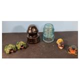 Antique insulators, ceramic frogs