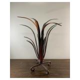 16" tall metal sculpture.