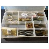 Plastic container of fishing lures