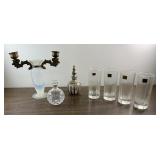 8" tall glass and brass candle holder. Four