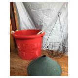 Round red tote to metal plant hangers and a