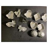 Vintage aluminum cookie cutters and Jell-O molds