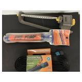 Sprinkler, soaker hose and hand pump