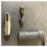 4" flashlight, multi tool and pocket knife