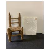 13" tall woven chair and a pack of card stock