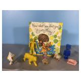 Small vintage book and toy animals