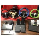 Video game driving simulator controllers