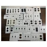Large lot of light switch & plug in plates