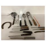 Kitchen utensils, measuring cups, knives, spoons
