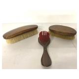 3 vintage garment brushes, smallest is also a