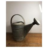 Galvanized tin watering can