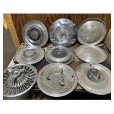 All kinds of vintage hubcaps