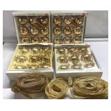 Gold-colored Christmas ornaments & ribbon