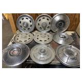 All kinds of vintage hubcaps