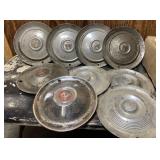 All kinds of vintage hubcaps