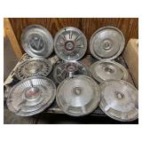 All kinds of vintage hubcaps