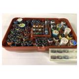Sewing box full of spools of thread