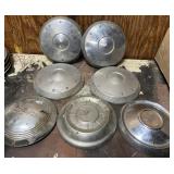 All kinds of vintage hubcaps-Ford