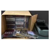 Box of CDs and CD holder