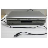 Toshiba VCR/DVD player-turns on when plugged in