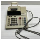 Vintage Sharp adding machine-turns on when