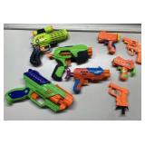 Variety of toy guns Variety of toy guns