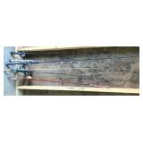 Lot of fishing poles Lot of fishing poles