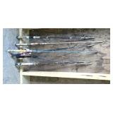 Lot of fishing poles Lot of fishing poles