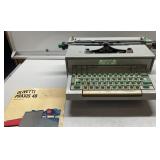 Vintage OIlivetti Praxix type writer-turns on when Vintage OIlivetti Praxix type writer-turns on when
