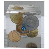 Advertising paperweight with coins in it Advertising paperweight with coins in it