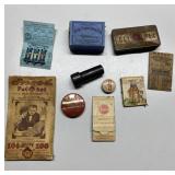 Antique tins, matchbook, more