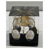 NEAT coin paperweight