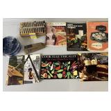 Cookbooks, matches, CDs, stapler
