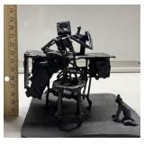 Metal sewing machine lady