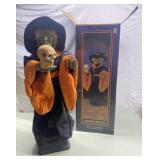 Animated witch holding skull 23' tall Animated witch holding skull 23' tall