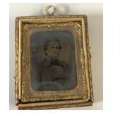 Antique tin photo in frame (in small section) Antique tin photo in frame (in small section)