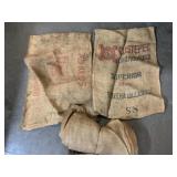 At least 5 burlap sacks