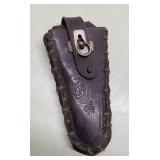 Antique leather tooled holster