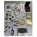 An opal, Rolex spoon, coin necklace, cufflinks