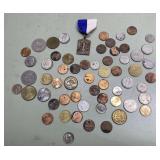 Coins and a medal Coins and a medal
