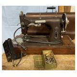 Antique Wilson sewing machine in case Antique Wilson sewing machine in case