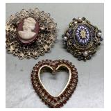 Vintage brooches incl cameo Vintage brooches incl cameo