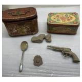 Tins, antique toy gun, spoon, badge more