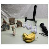 Wood houses, easel, fake bananas more