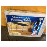 Adjustable Height Folding Table