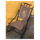 Antique embroidered rocking chair