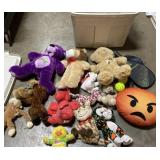 Tote of plush & pickle ball equipment