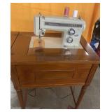 Vintage Kenmore sewing machine & cabinet