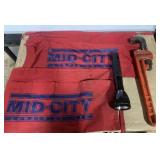 Pipe wrench, nail apron & flash light