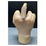 Novelty battery-operated middle finger hand